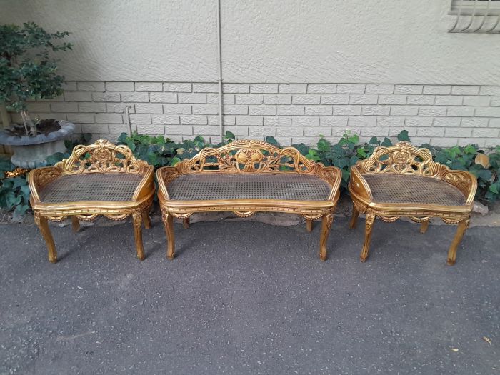 A French Style Set Of Carved and Hand-Gilded Rattan Settee With Two Chairs