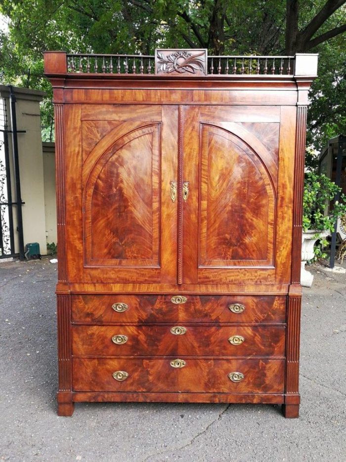 A Late Georgian Linen Press in Flame Mahogany with a Gallery Ornate Crown Circa 1780s