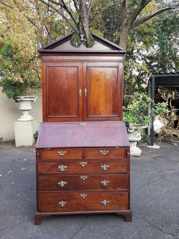 An early 19th Century George III oak bureau bookcase