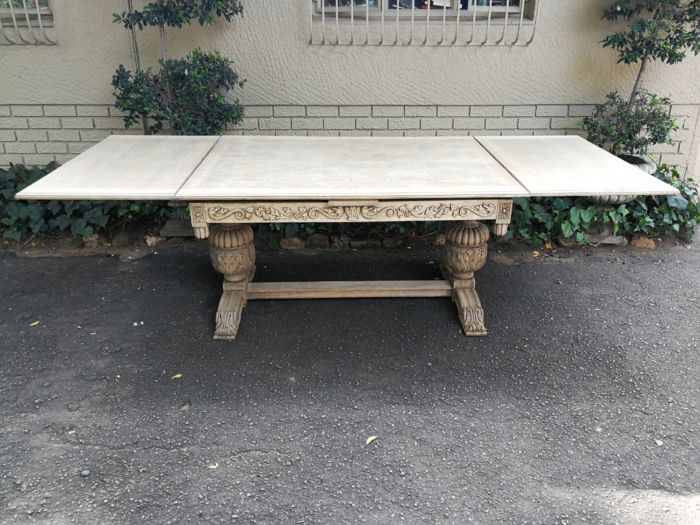 A 20TH Century Carved Dutch Oak Extension Dining / Entrance Table in a Contemporary Bleached Finish  (8 Seater)