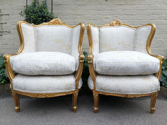 A Pair Of 20th Century French Style Gilt Bergere Armchairs Upholstered In A Custom-Made Hand Printed Linen With Gold Script Design By The Crown Collection - Image 3