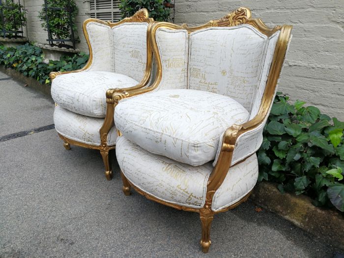 A Pair Of 20th Century French Style Gilt Bergere Armchairs Upholstered In A Custom-Made Hand Printed Linen With Gold Script Design By The Crown Collection - Image 5