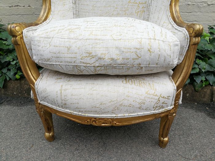 A Pair Of 20th Century French Style Gilt Bergere Armchairs Upholstered In A Custom-Made Hand Printed Linen With Gold Script Design By The Crown Collection - Image 7