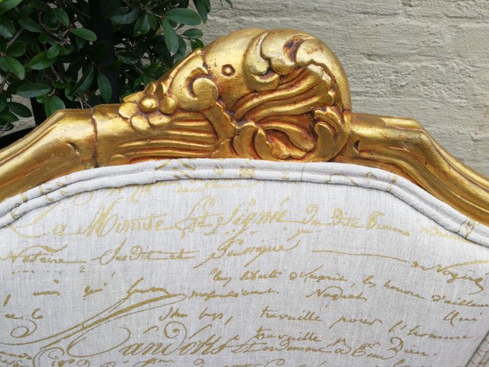 A Pair Of 20th Century French Style Gilt Bergere Armchairs Upholstered In A Custom-Made Hand Printed Linen With Gold Script Design By The Crown Collection - Image 8