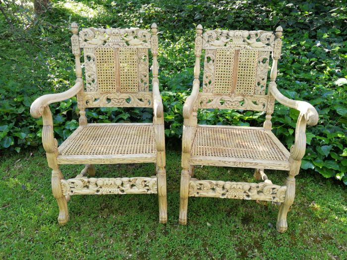 A Pair Or Ornately Carved And Bleached / Natural Wood Finish With Redone Rattan Arm Chairs - Image 3