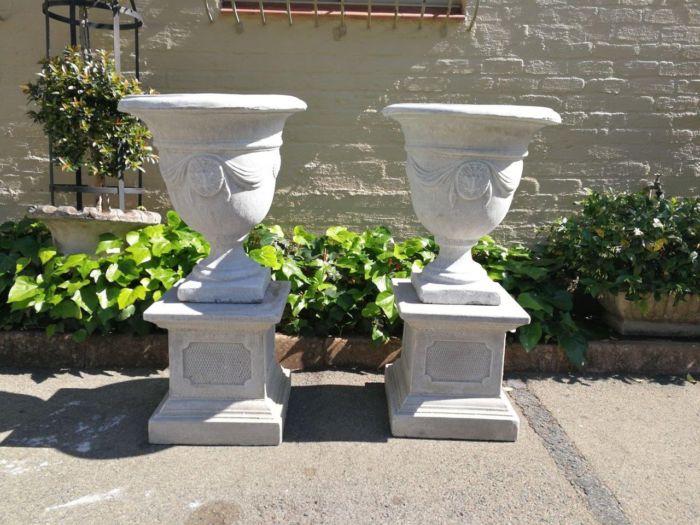 Pair Of Concrete Urns With The Plinths