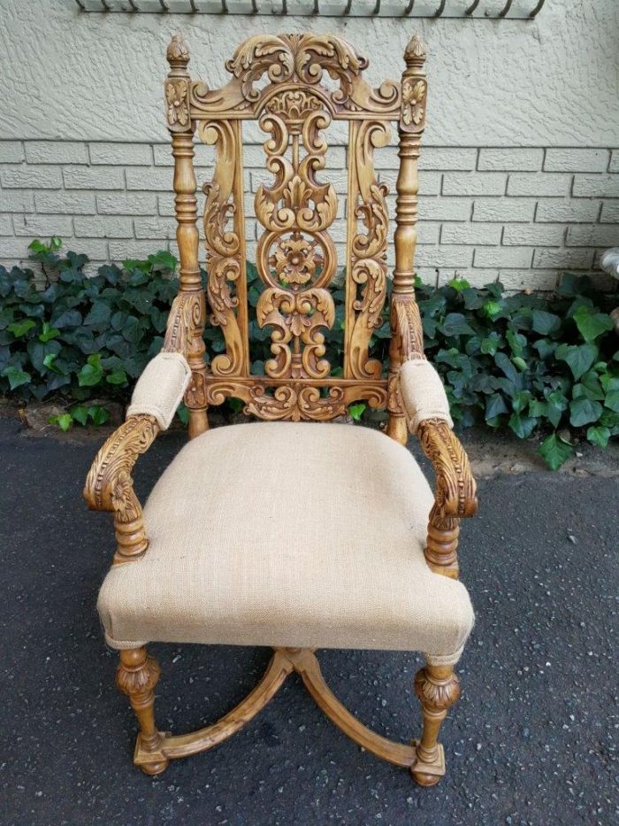 A Flemish Style Carved Wooden Armchair