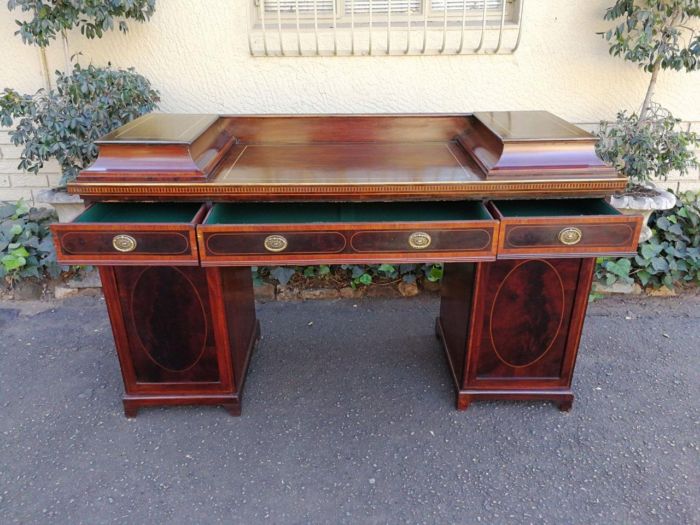 A Late Regency Inlaid Mahogany and Rosewood Pedestal Sideboard, fitted with original oval foliate brass escutcheons and loop handles and with a cellarette drawer - Image 5