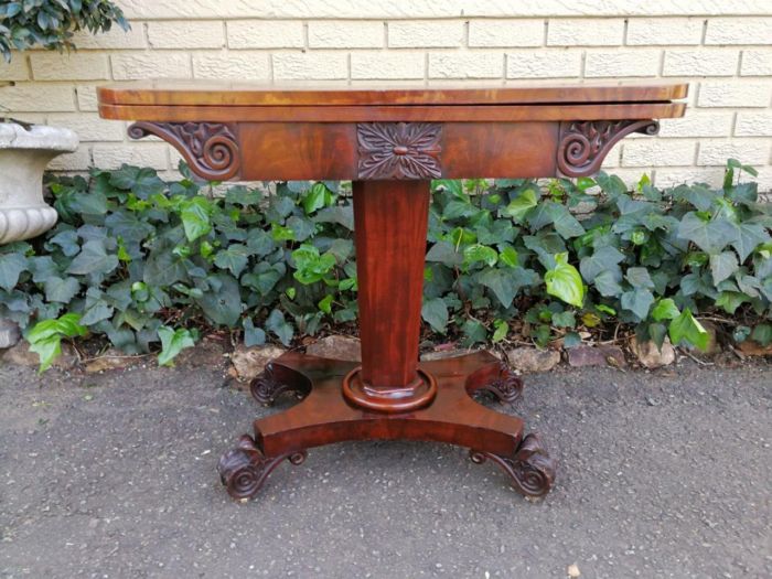 A Victorian Mahogany Folding Card Table on Castors