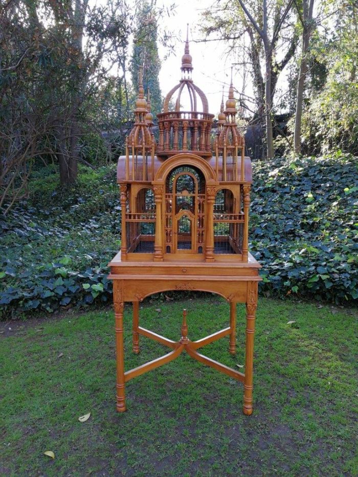 A 20th Century Carved Mahogany and Teak Wood Architectural Cathedral Style Bird Cage on Stand