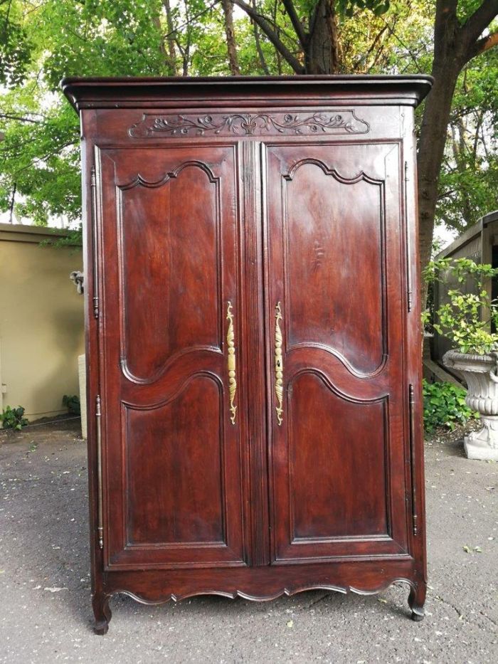 A Late 18th/early 19th century French Louis XV Oak Provincial Armoire