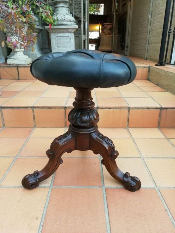 A 20th Century Carved Mahogany Piano Stool