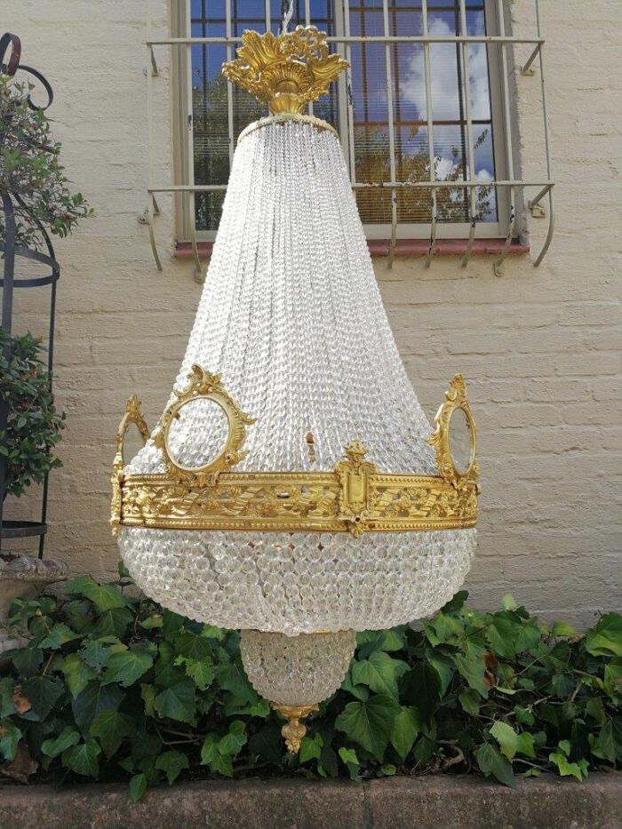 An Antique Gold Beaded Empire Style Chandelier