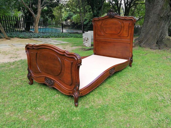 An Antique French Louis XV Carved Oak Bed