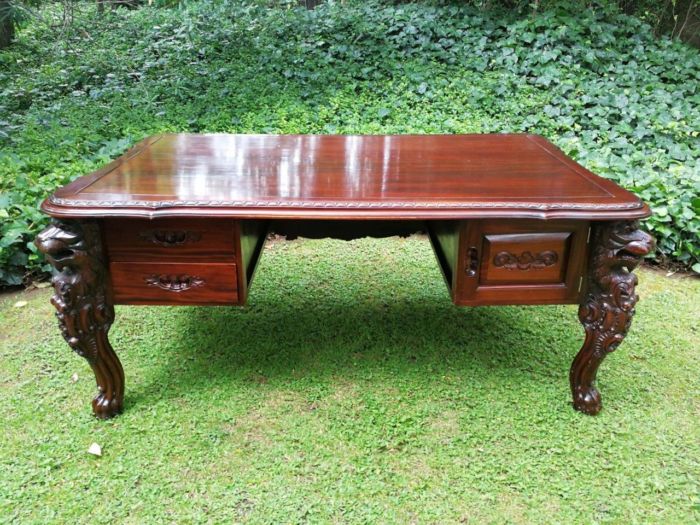 A 20th Century Large Carved Mahogany Desk