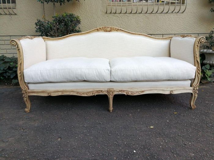 A Late 19th Century (Circa 1880) French Walnut Carved and Bleached Settee Upholstered in a French Linen with 3 Scatter Cushions