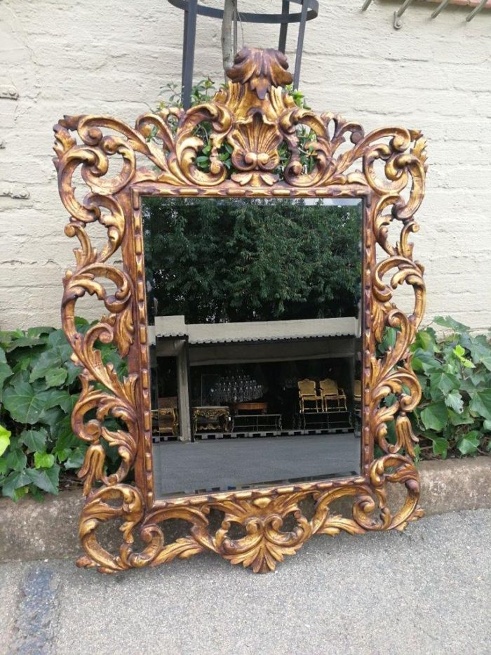 An Early 20th Century Spanish Carved Gilt Painted Wooden Bevelled Mirror