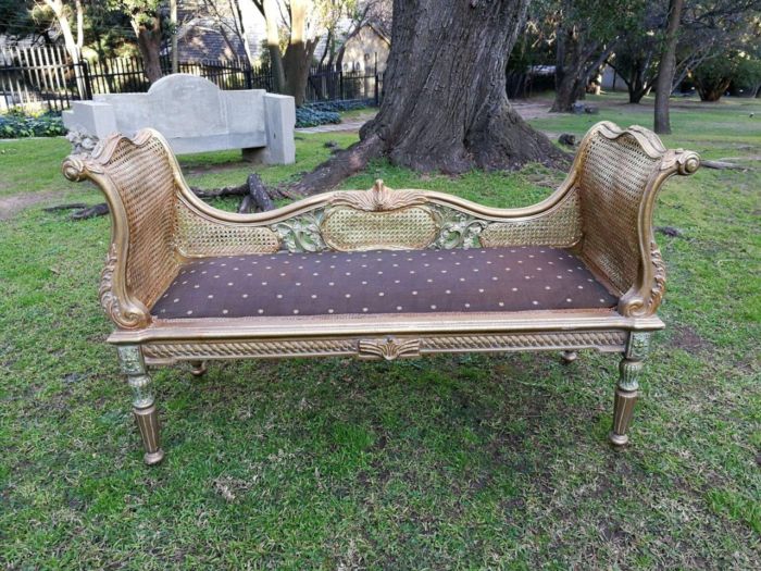 A French Style Carved Wooden Rattan Settee/Chaise in a Contemporary Bleached Finish