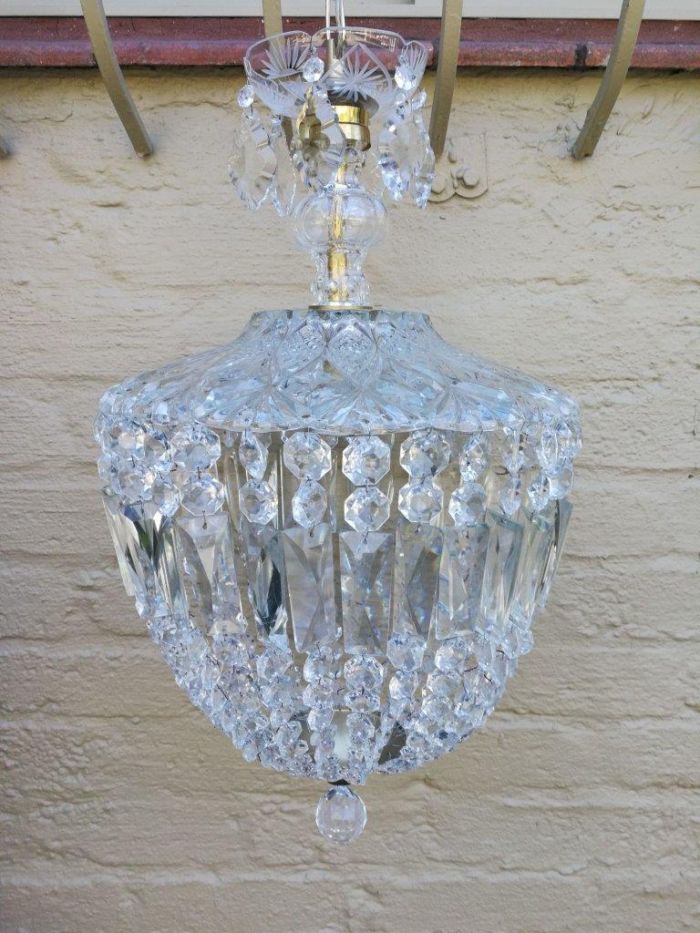 A French Style Brass and Crystal Plate Chandelier with Floral top