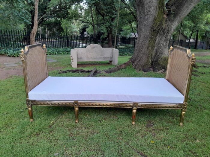 A French Style Hand Gilded Rattan Day Bed Upholstered In A White French Linen With Four Large Size Scatter Cushions - Image 2