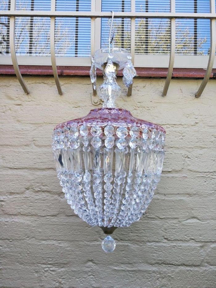 A French Style Brass and Crystal Plate Chandelier with a Floral Cerise Top