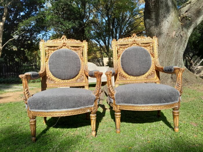 A 20th Century French Style Ornately Carved and Gilded Pair of Arm Chairs - Image 2