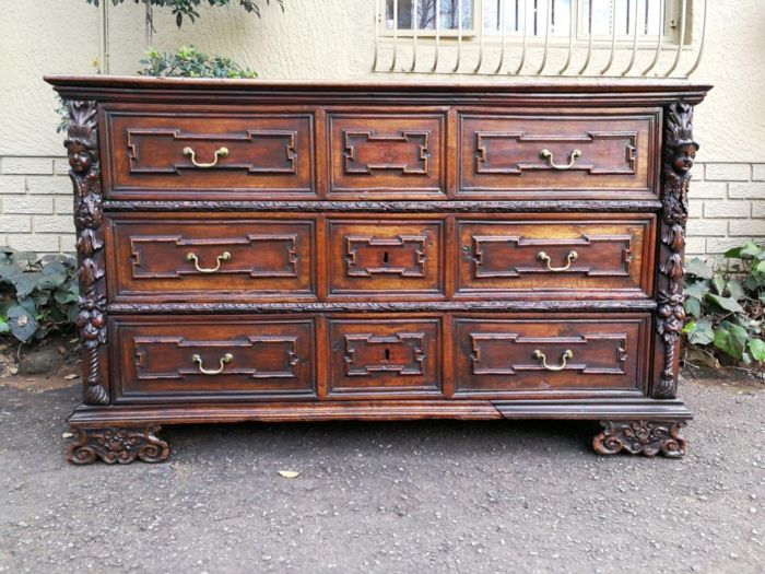 A Late 18thcentury Mahogany Carved Chest Of Drawers With British Antique Dealers Association Stamp With Original Brass Handles