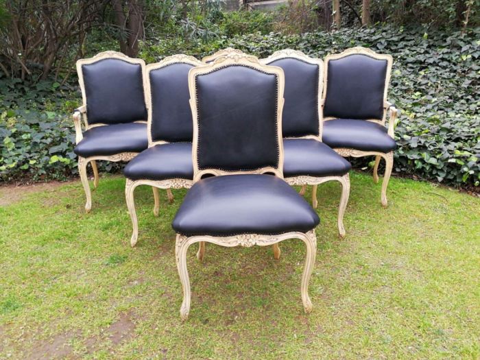 A 20th Century Set Of Six French Walnut Dining Chairs And Carvers In A Contemporary Bleached Finish And Upholstered In Leather