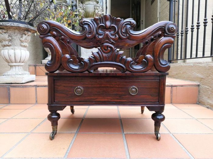 A Late 19th Century Victorian Rosewood Canterbury With Drawer And Brass Casters