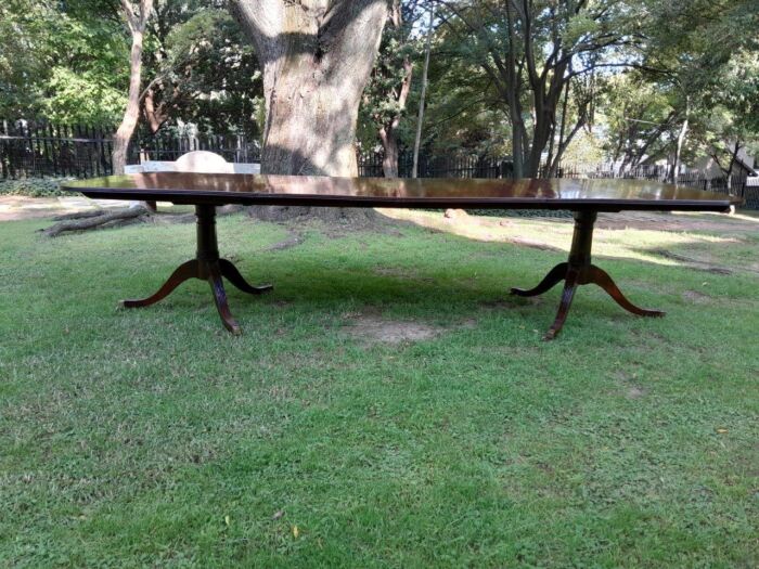 A 20th Century Regency-style Mahogany Extending Dining Table On Casters with Two Leaves and One Other - Image 2