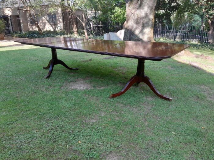 A 20th Century Regency-style Mahogany Extending Dining Table On Casters with Two Leaves and One Other - Image 3