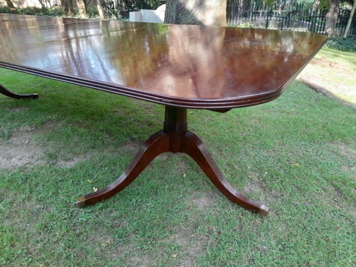 A 20th Century Regency-style Mahogany Extending Dining Table On Casters with Two Leaves and One Other - Image 7