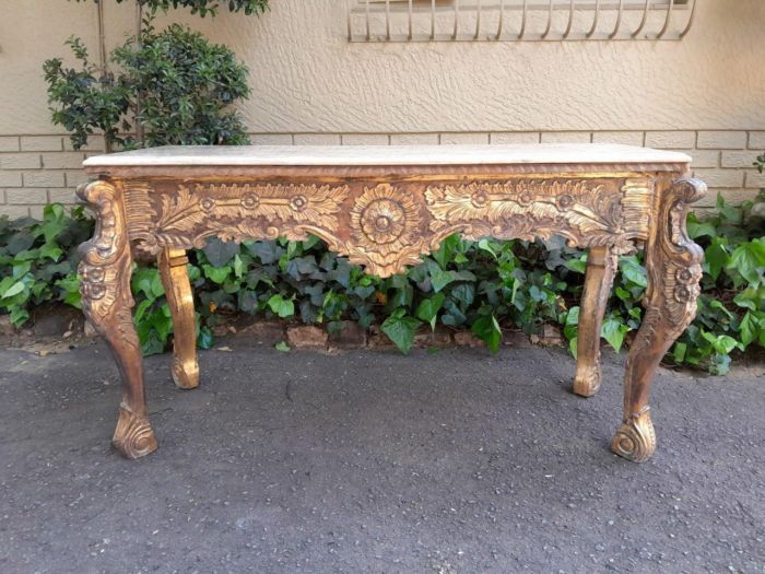 A 20th Century Ornately Carved Server/ Console/Entrance Hall Table with a Marble Top