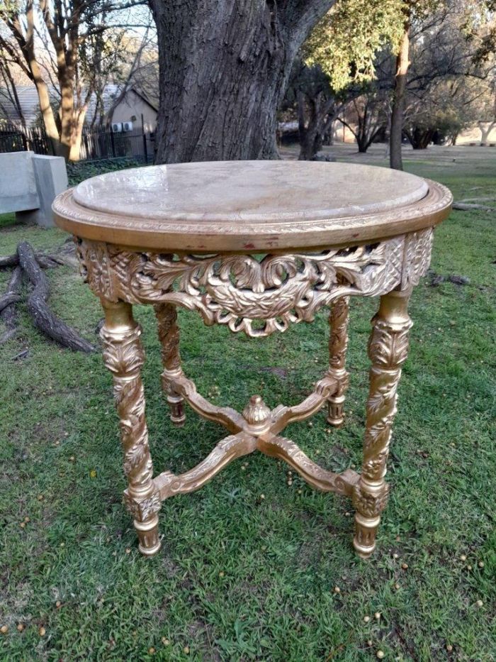 A 20TH Century French Style Carved and Hand Gilded Side Table with Marble Top