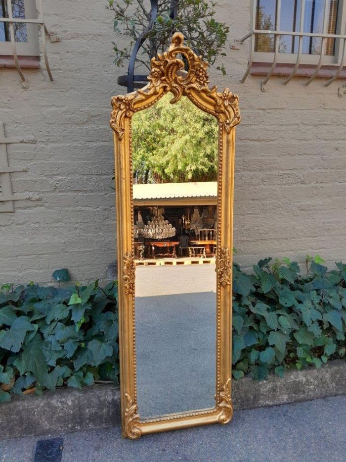 An Ornate Rococo French Style Carved Bevelled Mirror