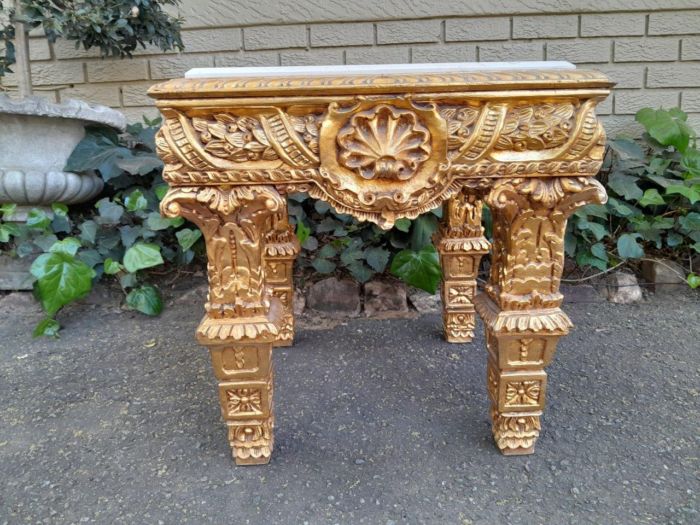 A 20th Century French Style Ornately Carved Side Table with Marble Top