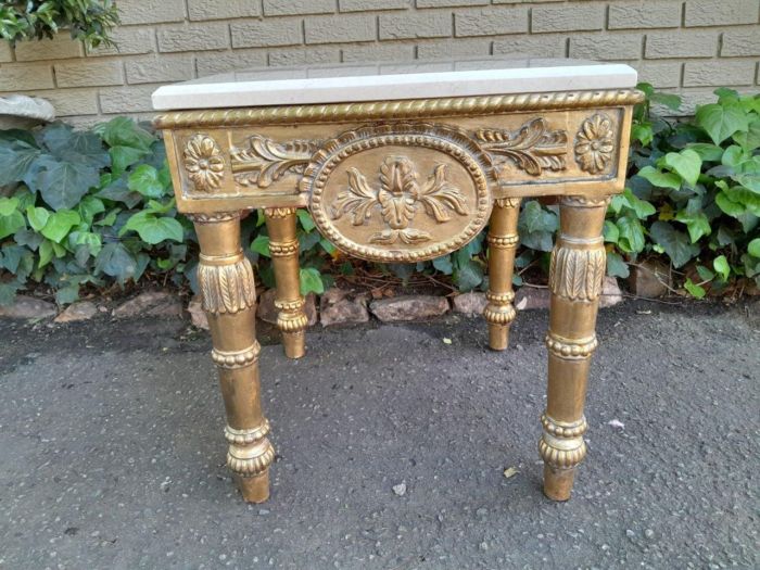 A 20th Century French Style Ornately Carved Side Table with Marble Top