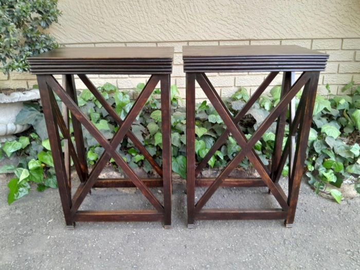 A 20th Century Pair of Teak Stands