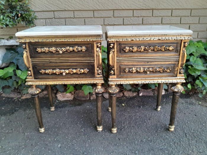 A Pair of French Style Ornately Carved Giltwood Pedestals/Side Tables with Cream Marble Tops