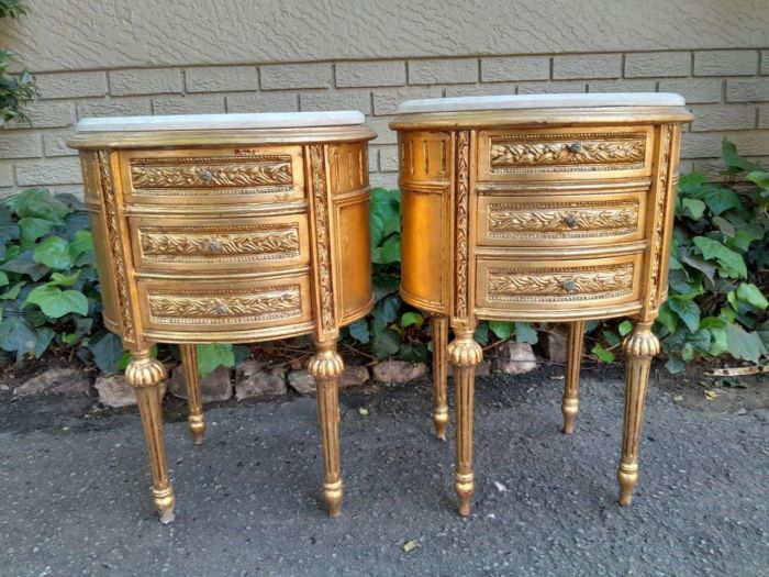 A Pair of French Style Hand-Gilded Oval Pedestals/Side Tables with Cream Marble Tops