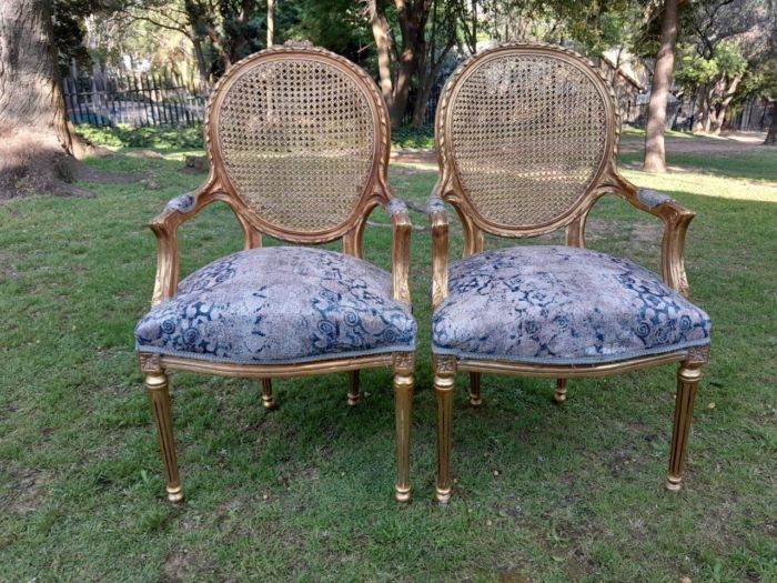 A Pair of 20th Century French Style Rattan-Back Gilded Arm Chairs