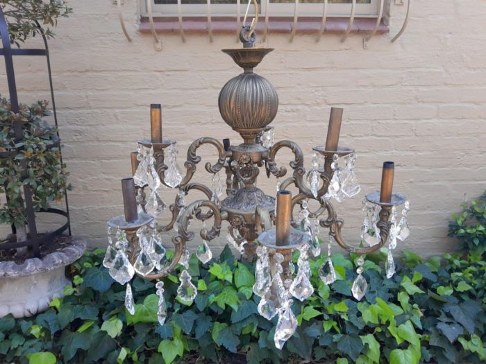 A 20th Century French Style Brass and Crystal Chandelier