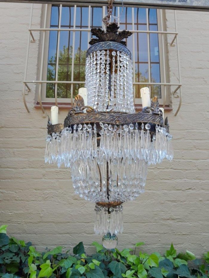 A 20th Century French Style Brass and Crystal Chandelier