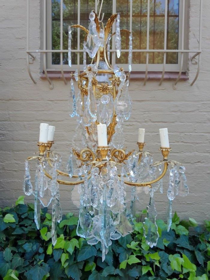 A 20th Century French Style Brass and Crystal Chandelier