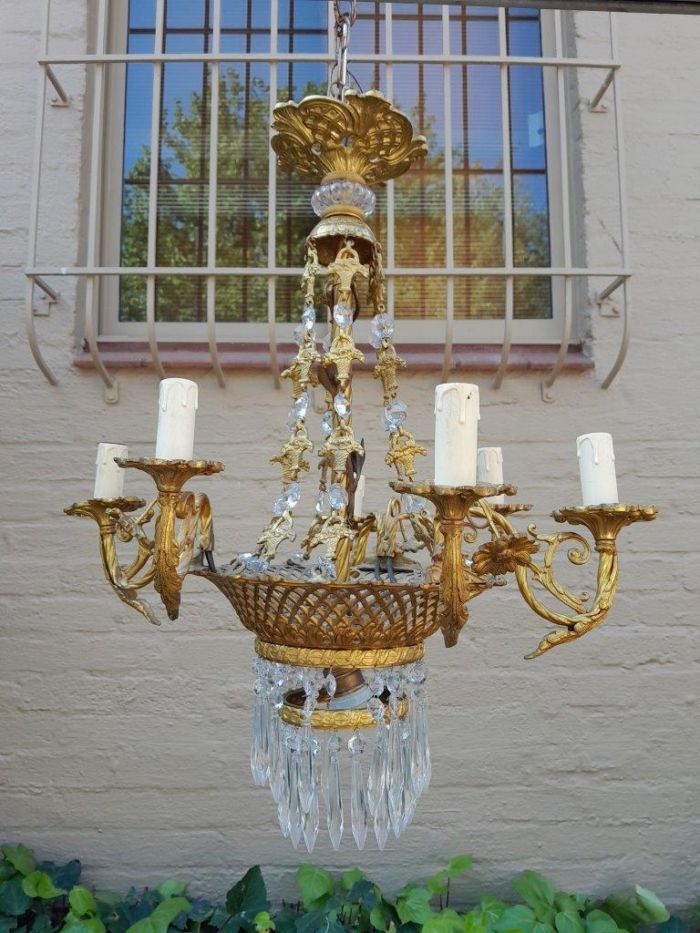 A 20th Century French Style Brass & Aged Crystal Chandelier