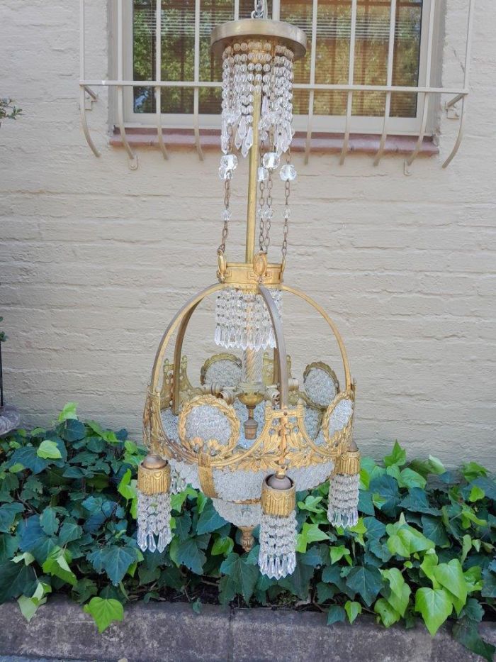 A 20th Century French Style Brass & Aged Crystal Chandelier