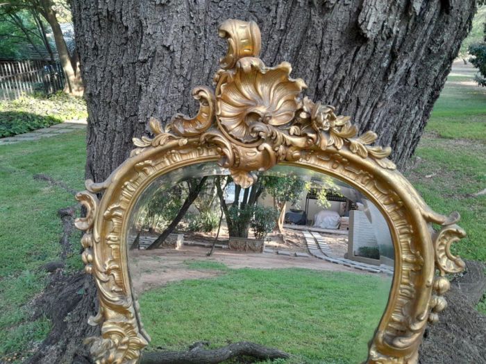 A French Rococo Style Ornately Carved and Gilded Bevelled Mirror - Image 4