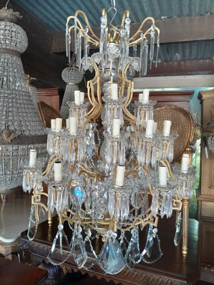 A 20th Century Large French Style Brass And Crystal Chandelier