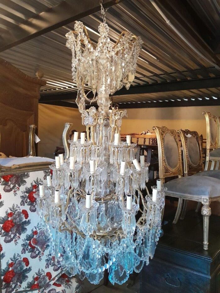 A 20th Century Large French Style Brass And Crystal Chandelier