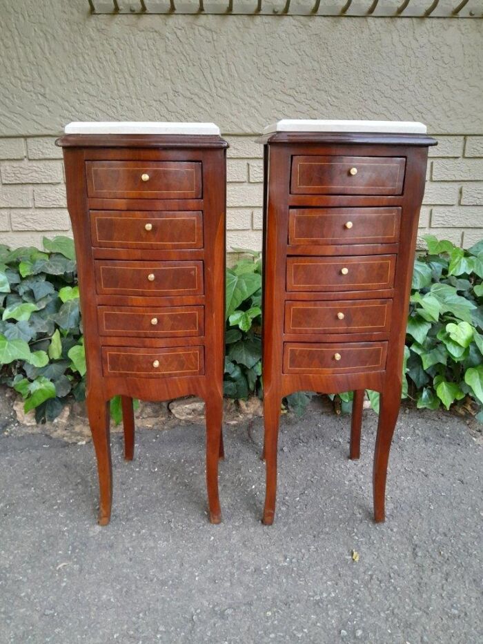 A Pair Of 20th Century French Style Walnut With Inlaid Pedestals With  Five Drawers And Cream Marble Top And Brass Handles